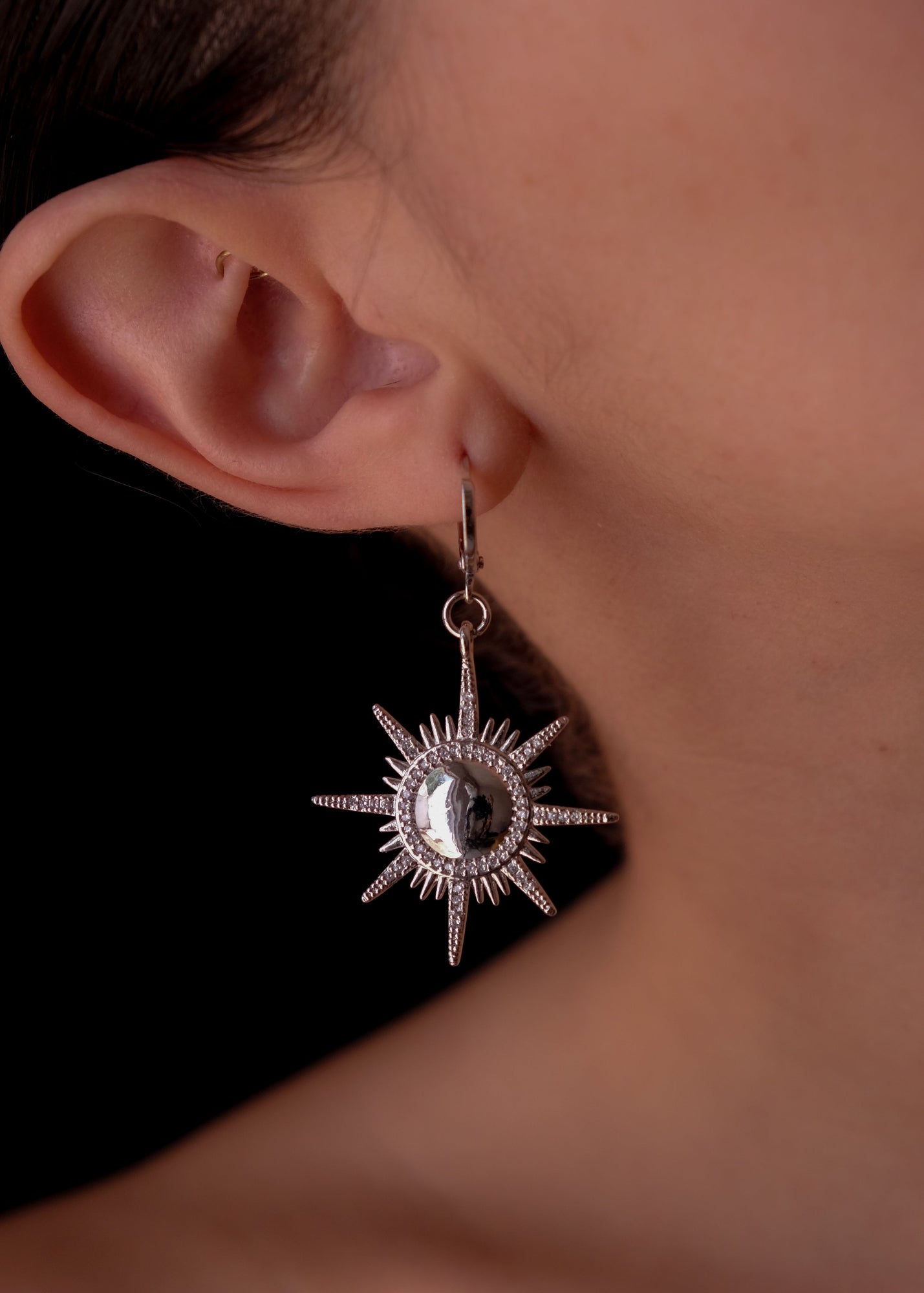 Silver suns earrings